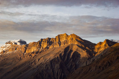 Panoramic view of rocky mountains against sky