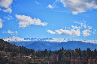 Low angle view of snowcapped mountains at sierra nevada against sky