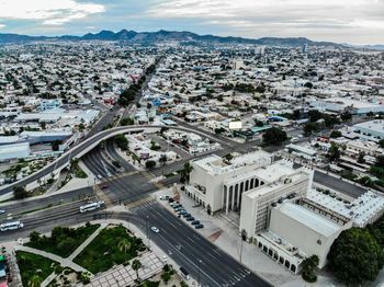 High angle view of street amidst buildings in city