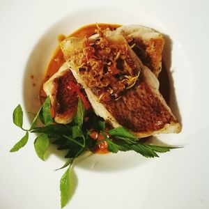 Close-up of served food in plate