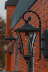 Street light on wall of building