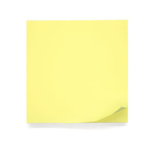 Yellow pattern on paper against white background