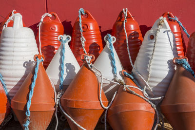 Close-up of multi colored buoys