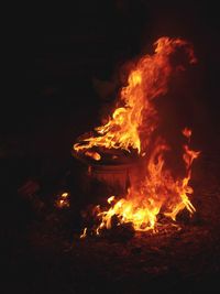 Bonfire on field at night