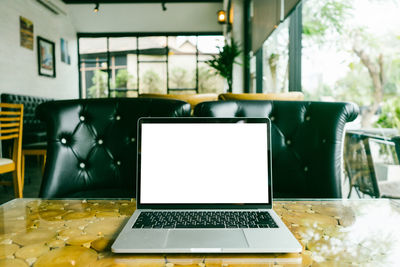 Close-up of laptop on table