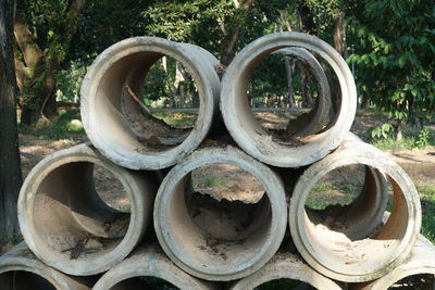 Close-up of old abandoned wheel on field