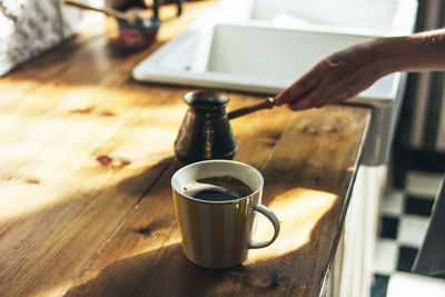 Close-up of cappuccino on table