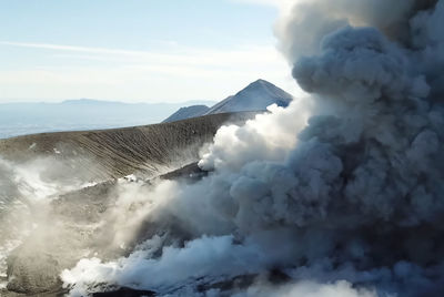 Panoramic view of volcanic landscape against sky