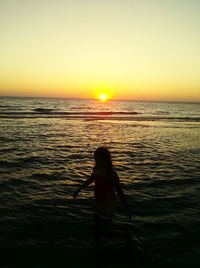 Scenic view of sea at sunset