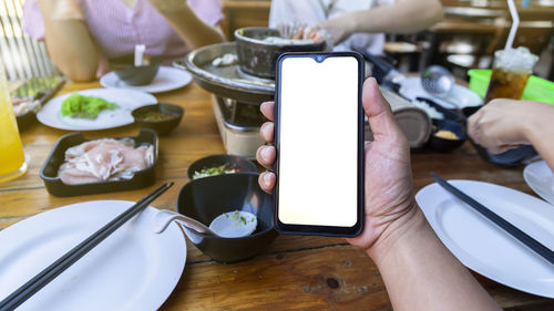 High angle view of person having food in restaurant