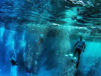 Group of people in swimming pool