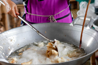 Man preparing food in kitchen
