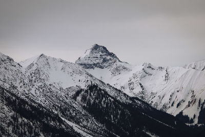 Scenic view of snowcapped mountain against sky