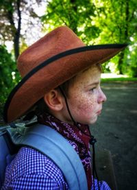 Close-up of boy wearing hat