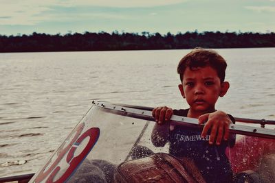 Portrait of boy in water