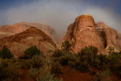 Rock formations on mountain against sky