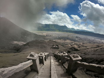 Panoramic view of landscape against cloudy sky