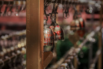 Close-up of decoration hanging on metal for sale