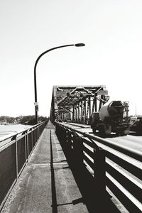 Empty road against clear sky