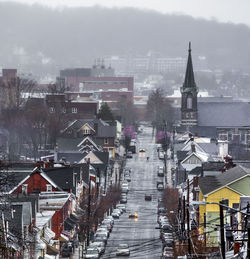 High angle view of buildings in city during winter