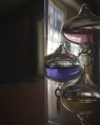 Close-up of glass on table at home