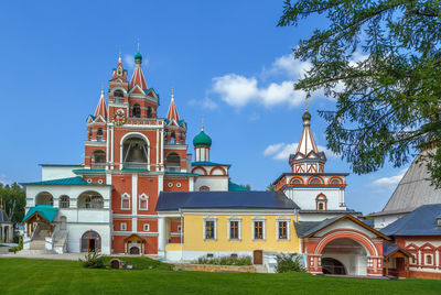 View of temple against building