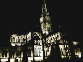 Low angle view of illuminated building at night