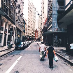 People walking on city street