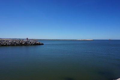 Scenic view of sea against clear sky