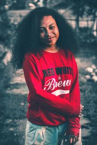 Portrait of teenage girl standing outdoors