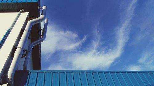 Low angle view of built structure against blue sky