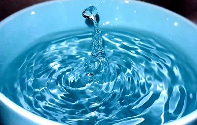 High angle view of drinking water splashing