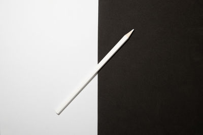 Close-up of colored pencils against white background