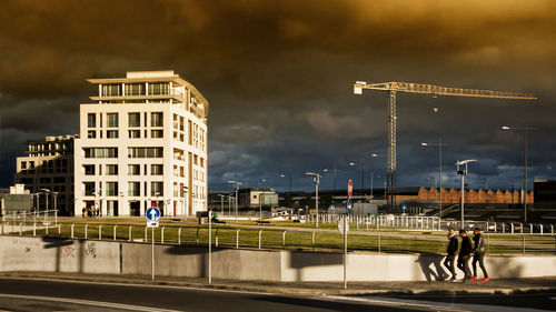 View of bridge in city against sky