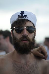 Portrait of young man wearing sunglasses