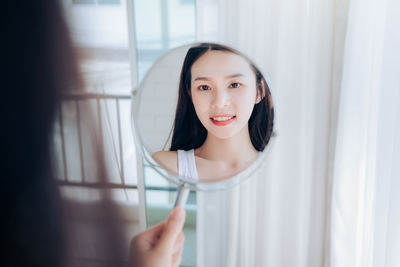 Portrait of a smiling young woman