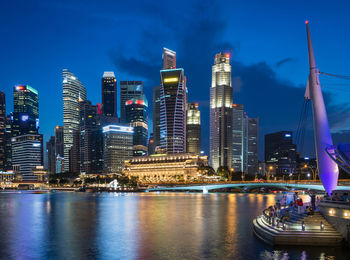 Illuminated city at waterfront
