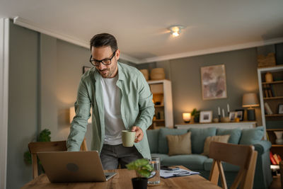 Young man working at home