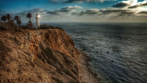 Scenic view of sea against cloudy sky