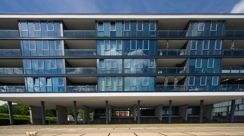 Exterior of modern building against blue sky