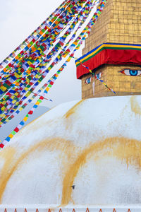 Low angle view of building against sky during winter