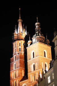 Low angle view of building against sky at night