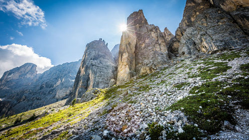 Rock formations on mountain against sky
