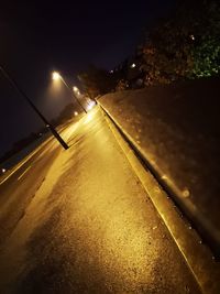 High angle view of illuminated street at night