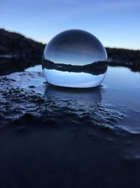 Close-up of a ball in calm water