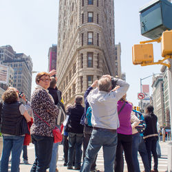 High angle view of people looking at city street