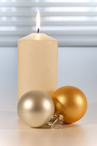Close-up of illuminated candle