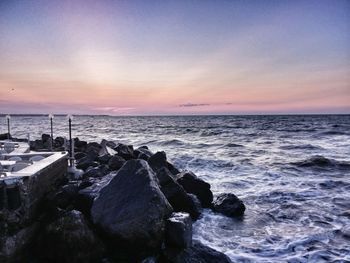 Scenic view of sea at sunset