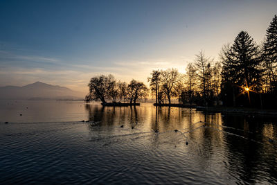 Scenic view of lake against sky during sunset zugersee cham 