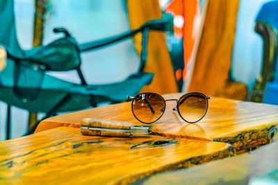 Close-up of sunglasses on table